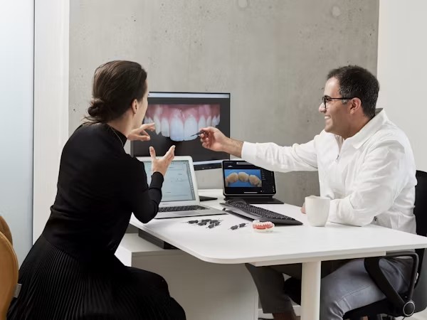 Dental technicians collaborating on digital prosthetic designs in California